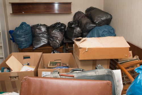 House clearance experts handling waste with safety measures